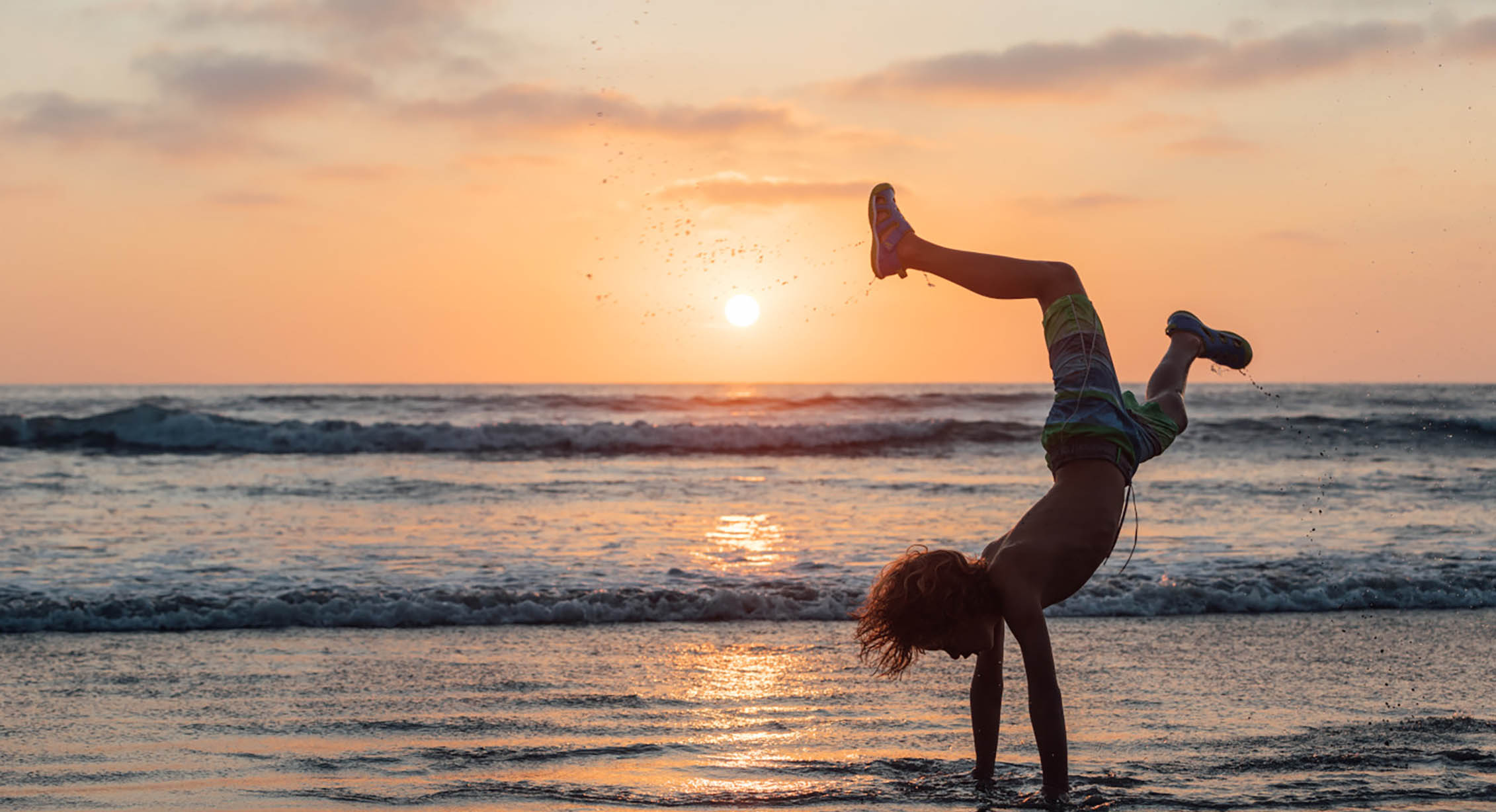 Handstand in KEEN sandals with pesticide-free odor control